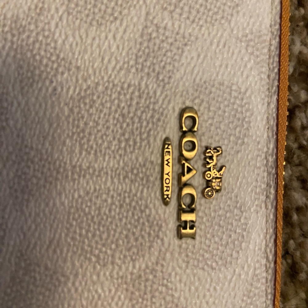 Coach Ivory Leather Accessory with Gold Accents
